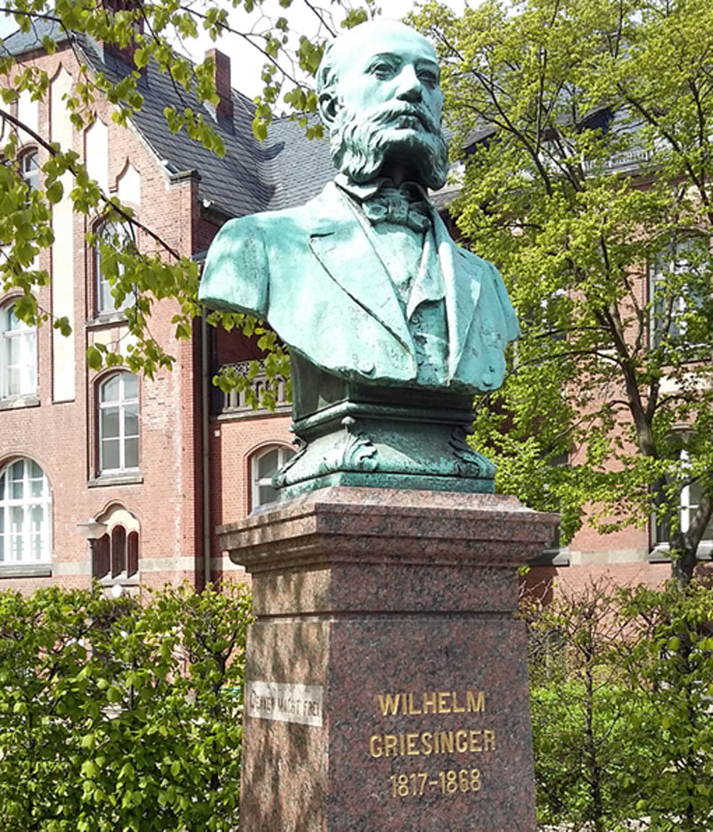 Wilhelm Griesinger vor der alten Psychatrie - einer der Begründer der modernen Psychiatrie